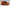 Orange and black sneaker on a light gray background