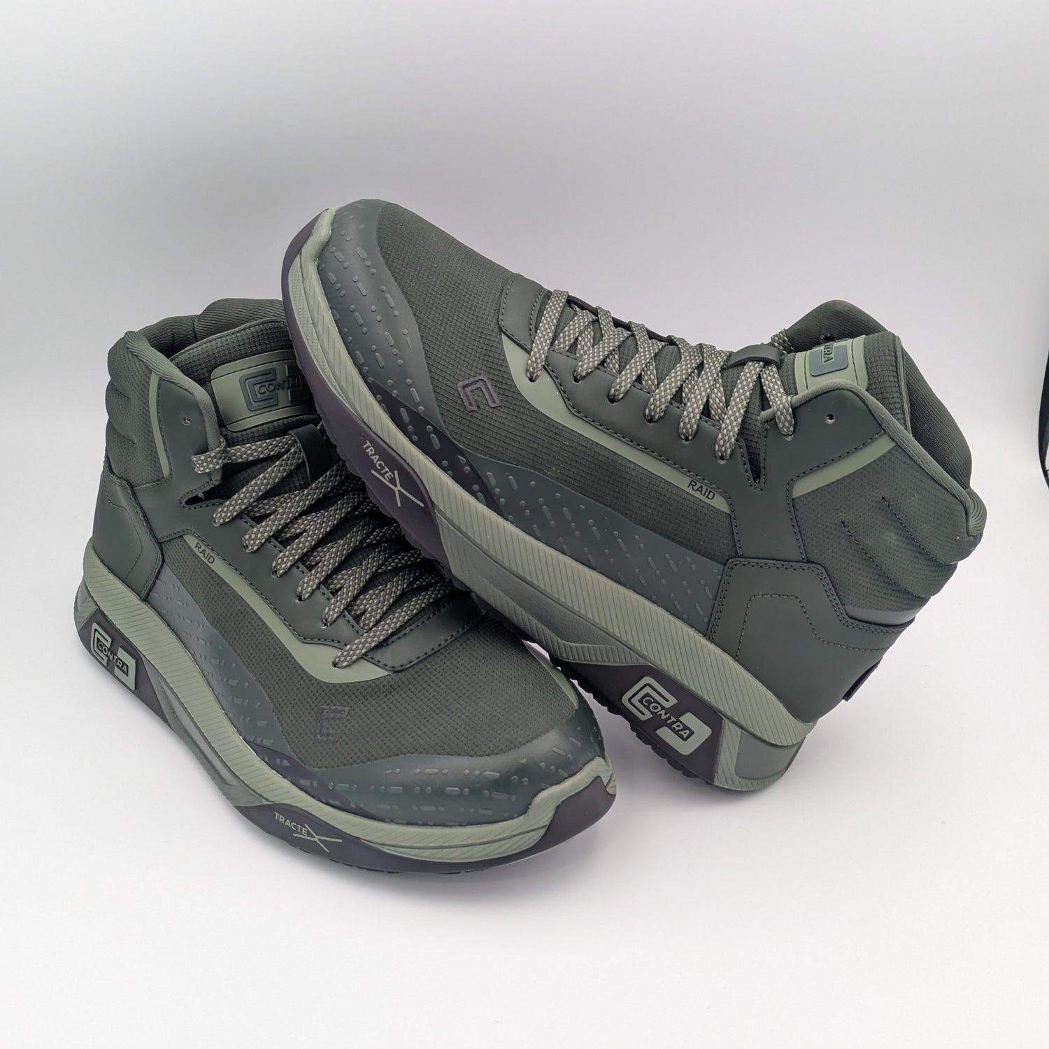 Pair of gray high-top sneakers on a white background