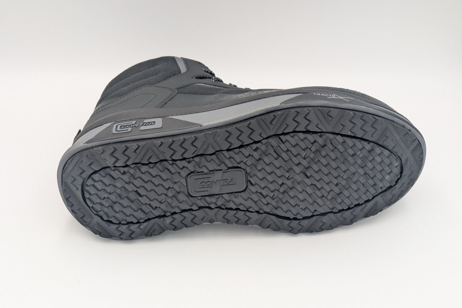 Gray work boot sole on a white background